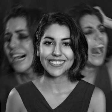 smiling face hiding despair and agony